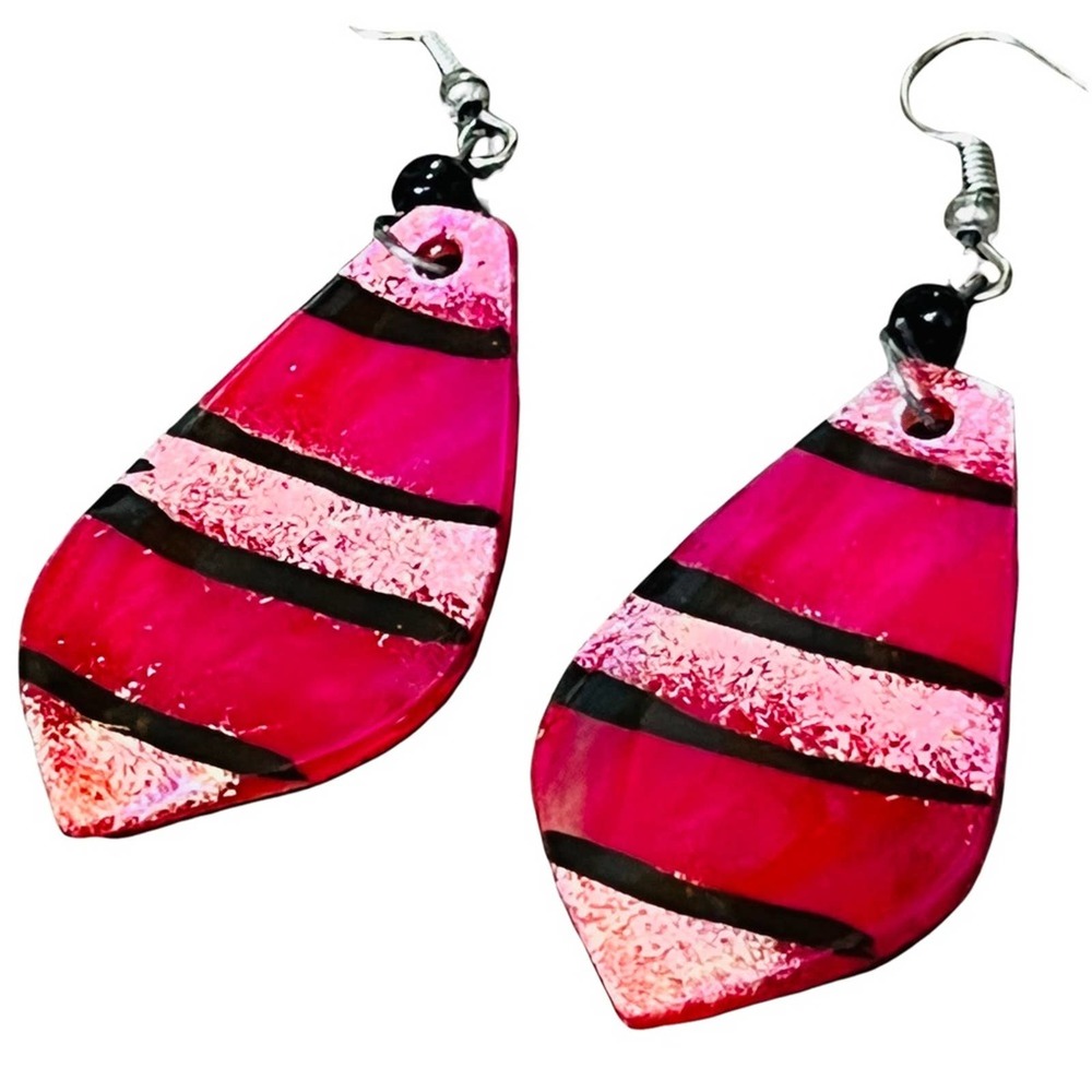 Horn earrings handmade in Africa. Benefits charity